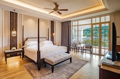 Four poster bed with a balcony in Grand Merchant 2-Bedroom Suite at The Danna Langkawi