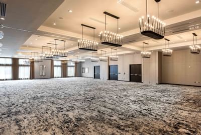 empty ballroom with chandeliers