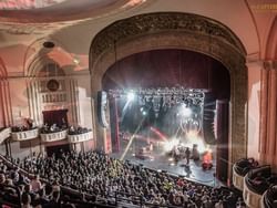 Rock band performs on the Capitol Theatre stage near J House Greenwich