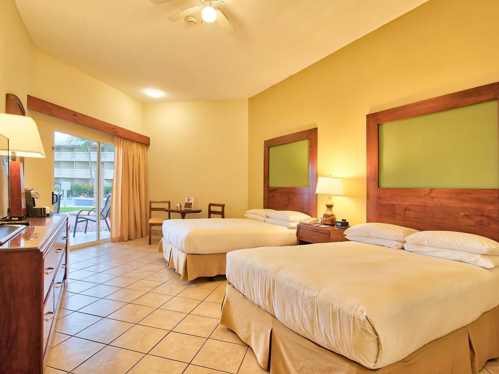 Spacious interior view of Accessibility Preference 2 Double Beds Room at Fiesta Resort