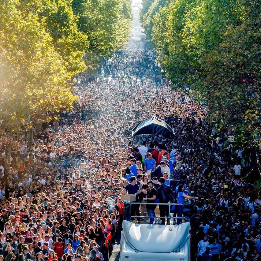 People on truck amidst crowd in Techno Parade, Originals Hotels