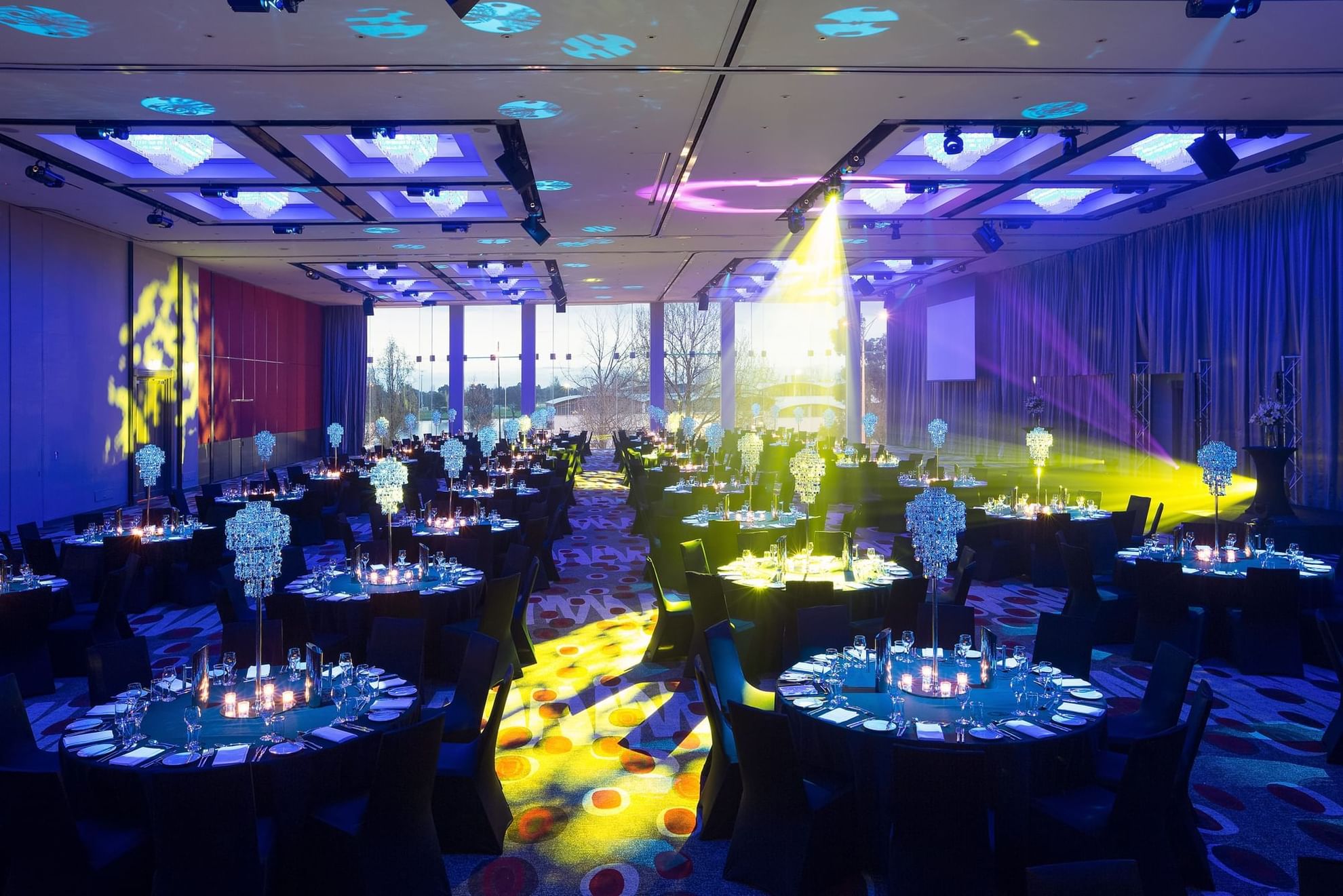 Banquet table set-up in Grand Ballroom with carpeted floors at Pullman Albert Park