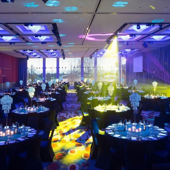 Banquet table set-up in Grand Ballroom with carpeted floors at Pullman Albert Park