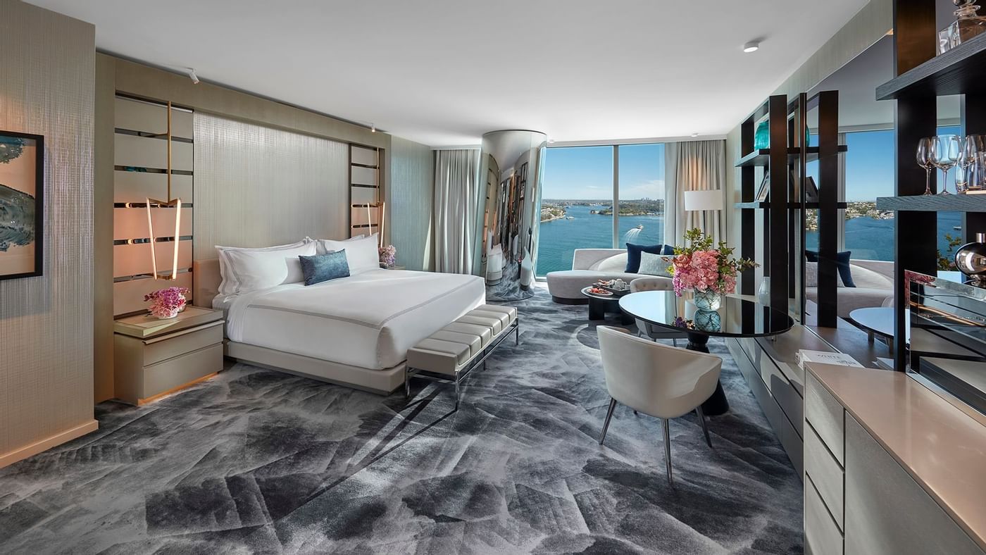 Interior of a bedroom in Deluxe King Room at Crown Hotels