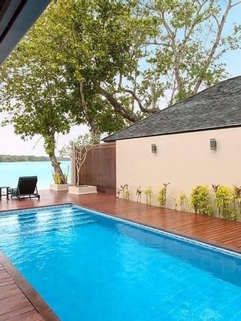 Private pool with wooden deck and ocean view at Warwick Le Lagon Efate.