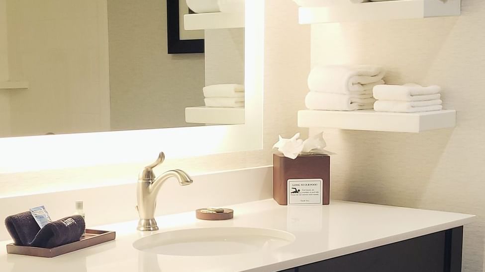 Modern bathroom featuring a clean sink with a stylish faucet in Double Queen Guestroom at Shangri-La Monkey Island