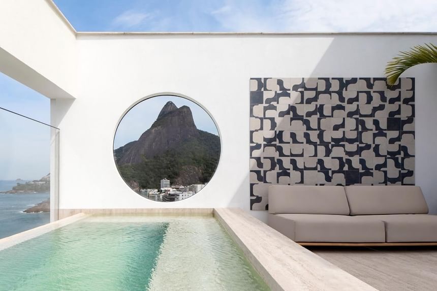 Indoor pool overlooking the mountain at Janeiro Hotel