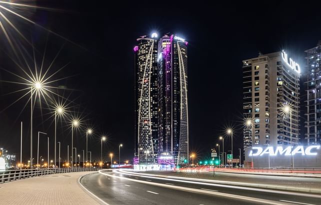 Exterior view of the hotel at night in Paramount Hotel Dubai