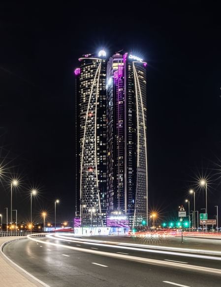 Exterior view of the hotel at night in Paramount Hotel Dubai