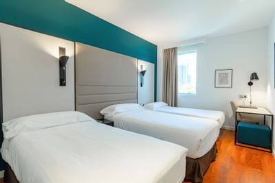 Habitación triple del Hotel Amura Alcobendas cerca de Madrid