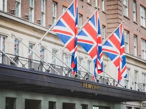 Three UK flags raised at The May Fair Hotel London