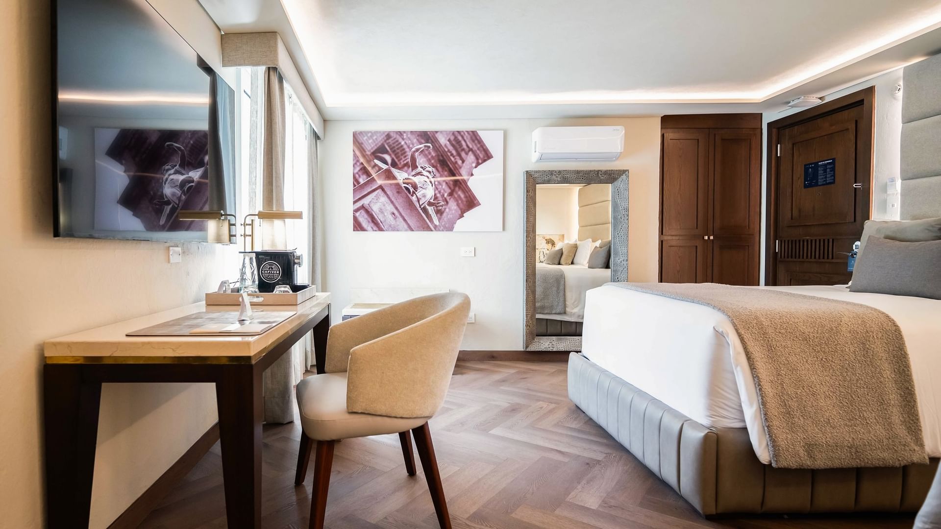 Two Double Deluxe room with desk and large bed at Quinta Real Puebla in Heroica Puebla de Zaragoza.