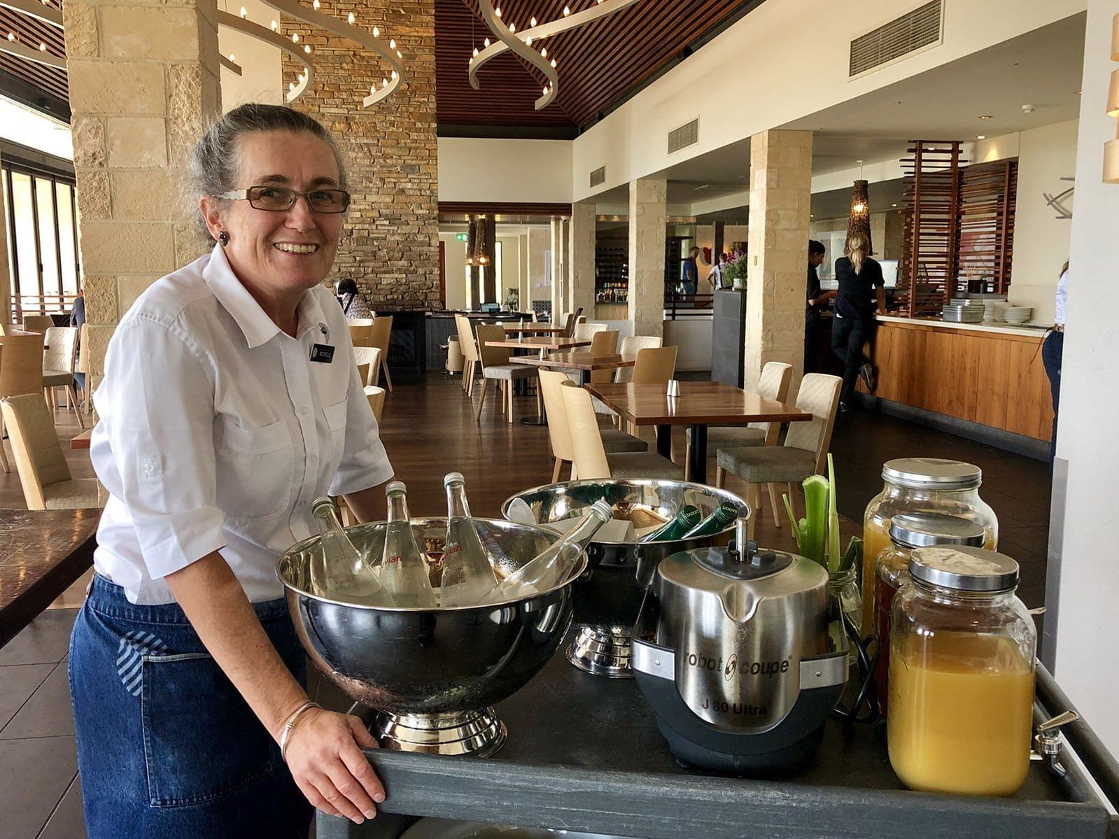 Staff posing at the buffet of Pullman Bunker Bay Resort