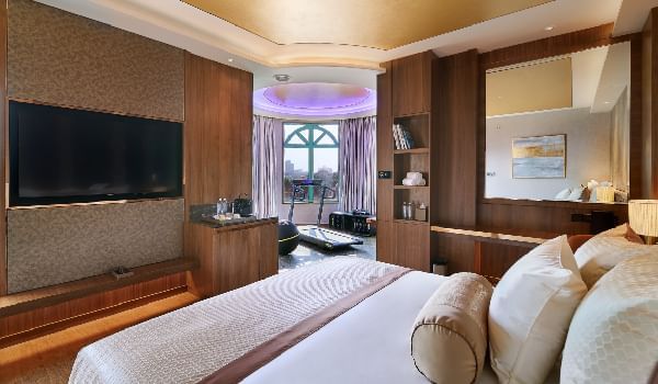 Comfy bed & TV in the Wellness Suite at Sunway Resort