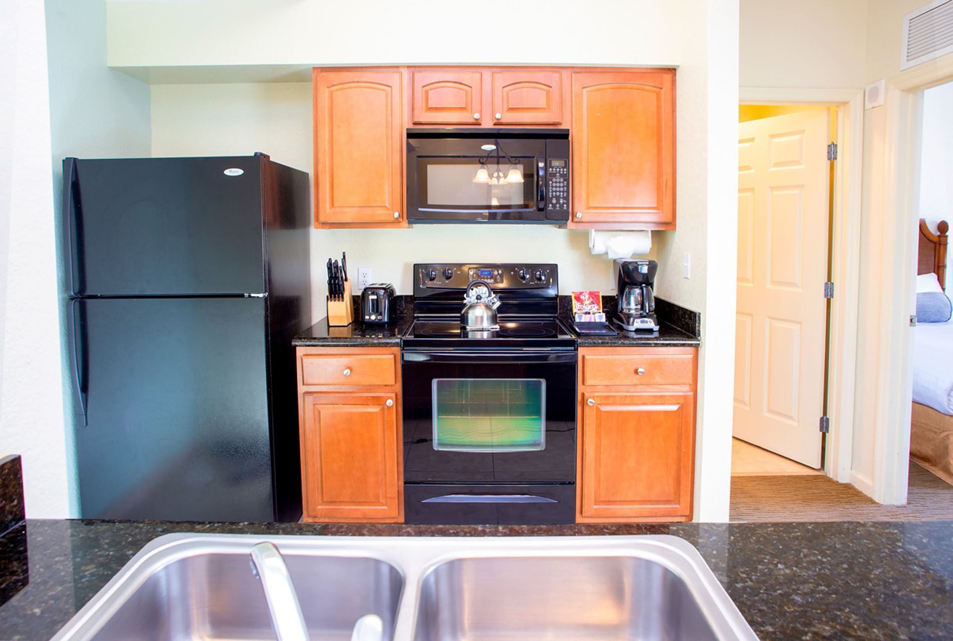 Kitchen in 3 Bedroom 3 Bath Suite at Lake Buena Vista Resort Village & Spa