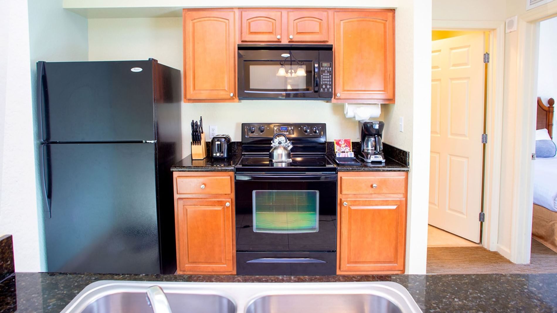 Kitchen in 3 Bedroom 3 Bath Suite at Lake Buena Vista Resort Village & Spa