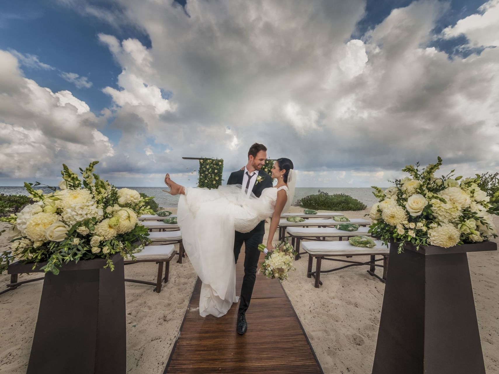 Close up of wedded couple posing at Haven Riviera Cancun