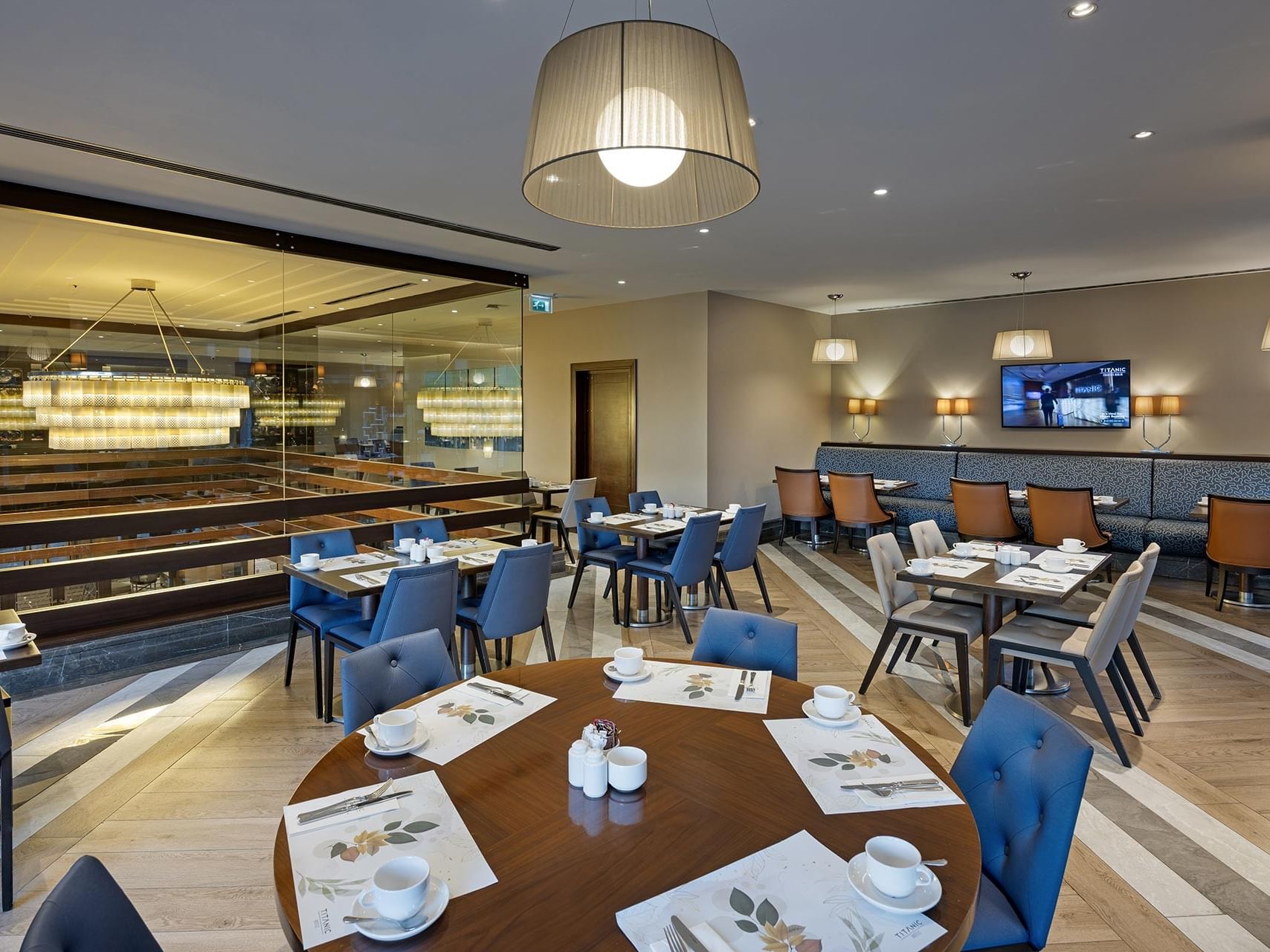  Dining area with lobby view in Alesta Restaurant at Titanic City Taksim.