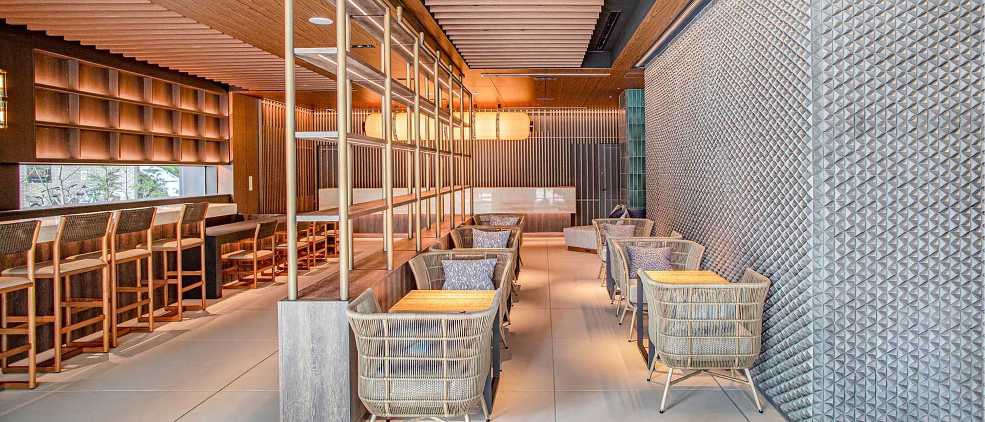 Interior of a dining area arranged with tables and chairs at Park Hotel Kyoto