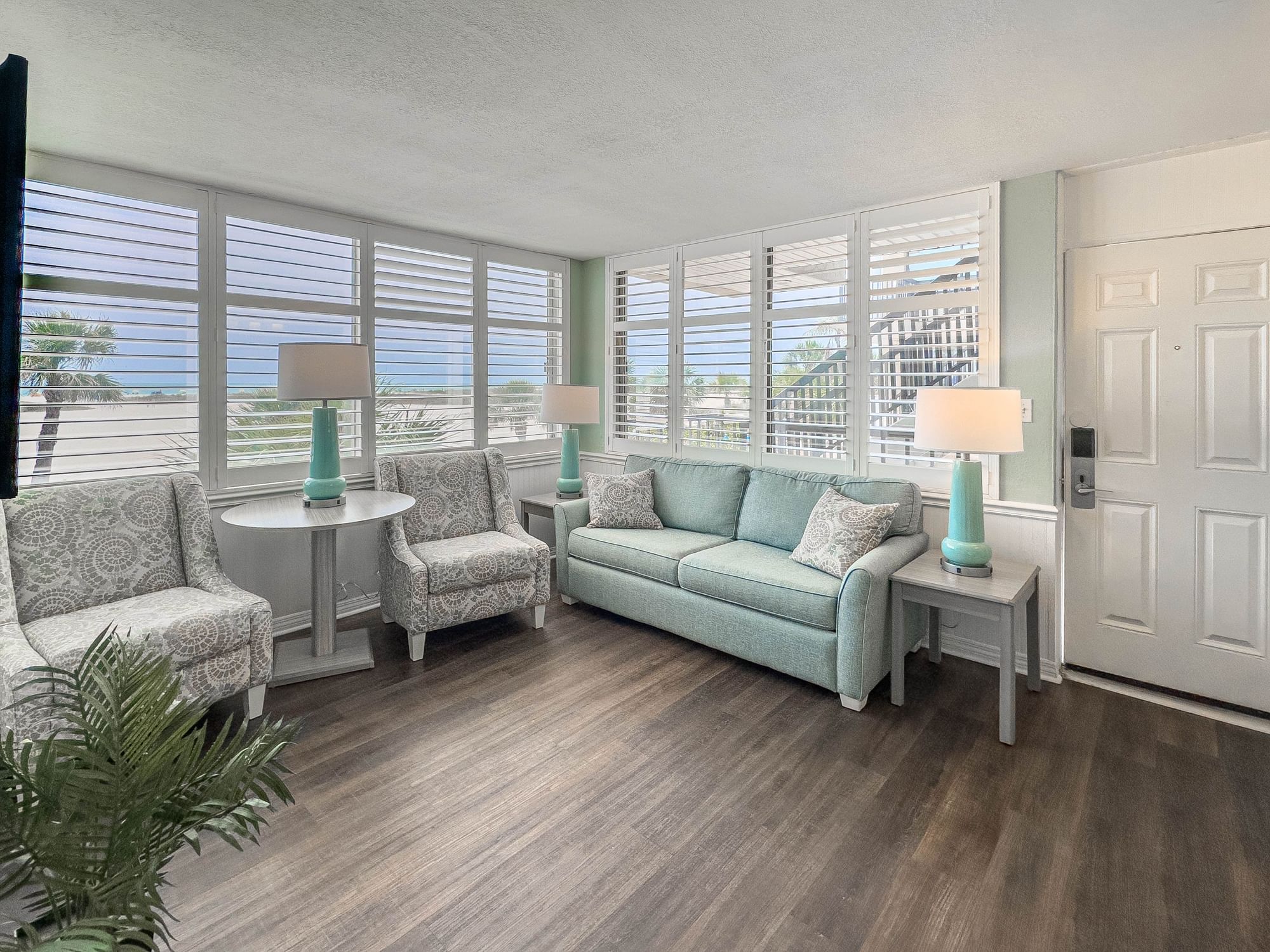 Living room in Gulf Front Suite at Thunderbird Beach Resort