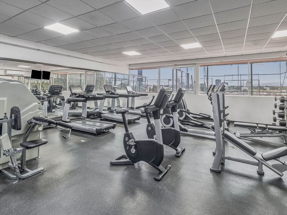 Interior of the fitness center at FA Hotels & Resorts