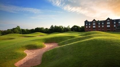 A golf course in front of the Hotel at Village Hotel Watford