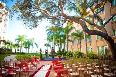 Courtyard with fountain set up for outdoor wedding.
