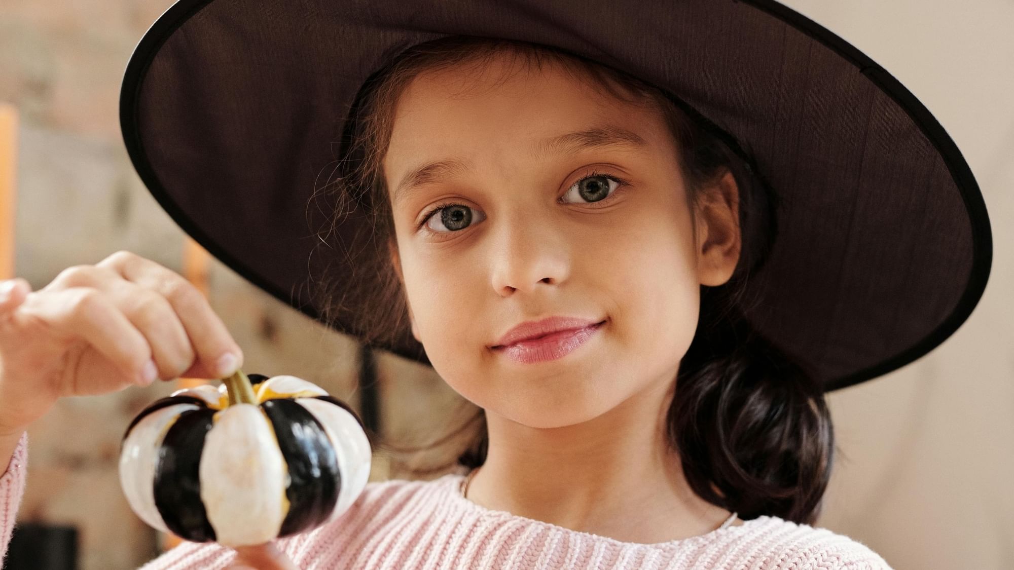 Girl with Halloween Pumpkin