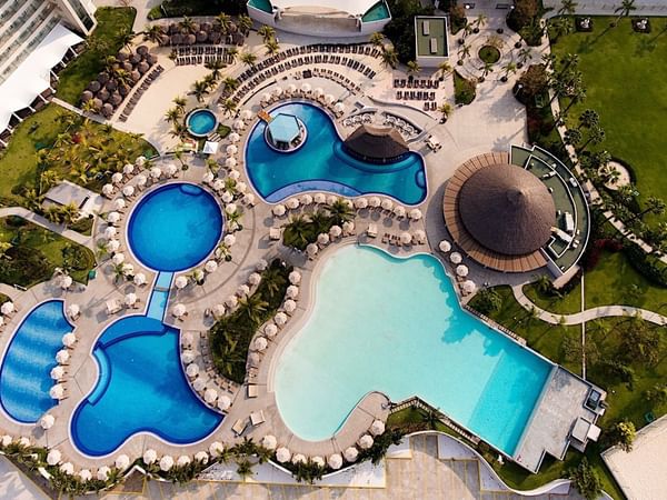 View of the pool area at Mundo Imperial from the sky