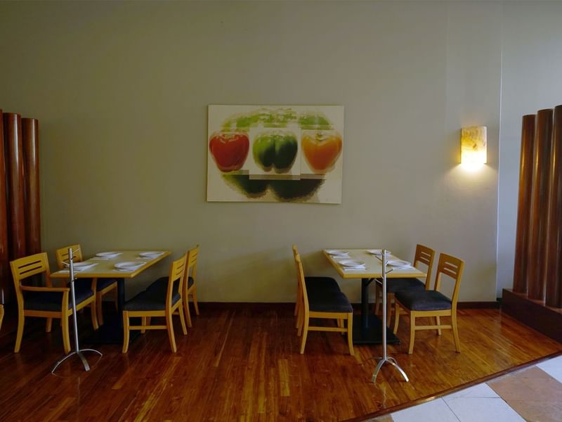 Dining tables set-up in Huapango Restaurant at Gamma Hotels