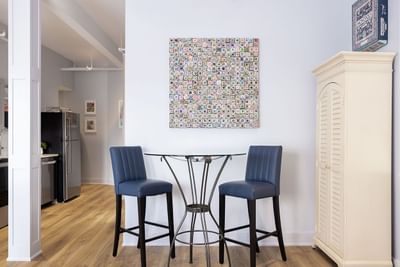 Sitting area with side cupboard in King Premiere lounge at Retro Suites Hotel