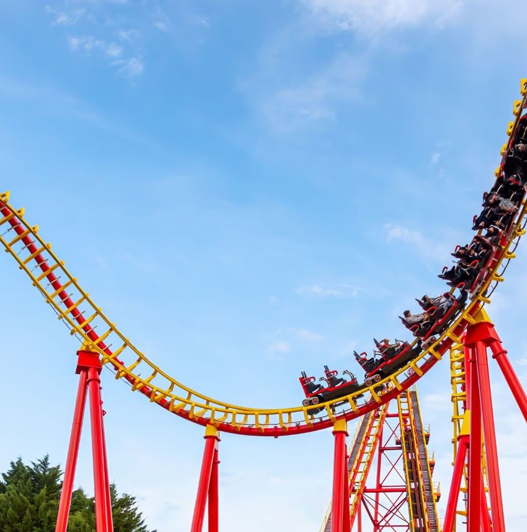 Thrilling yellow and red rollercoaster in Six Flags Mexico theme park near Camino Real Pedregal Mexico