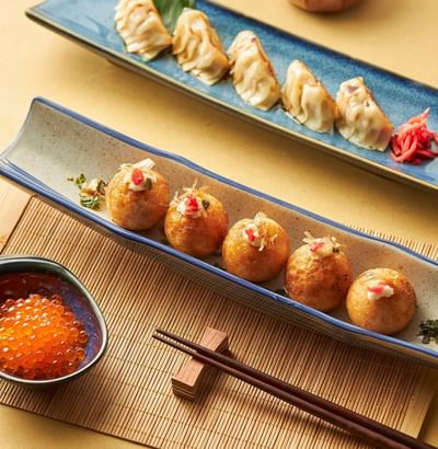 Close-up of Takoyaki platter served at Hanoi Daewoo Hotel