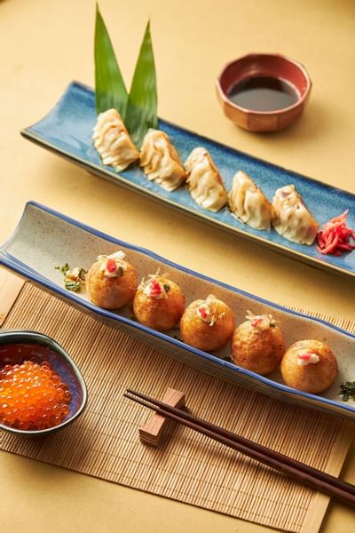 Close-up of Takoyaki platter served at Hanoi Daewoo Hotel
