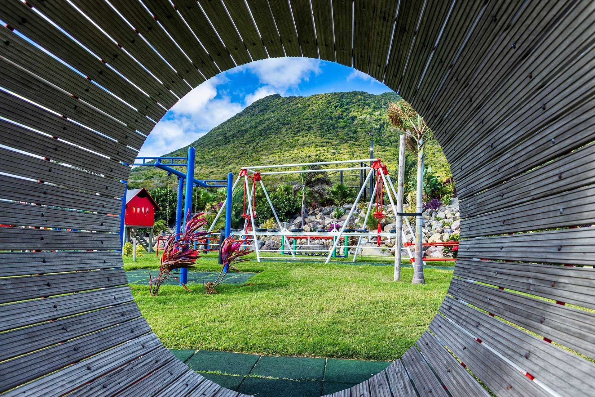 Playground view from a wooden barrel at Golden Rock Resort