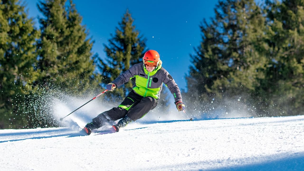 A Man skiing in Kelowna near Coast Capri Hotel.