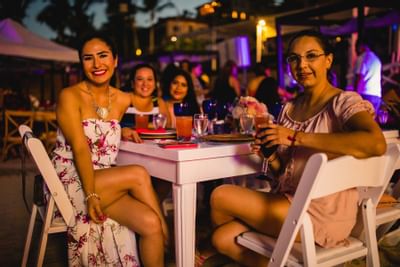 Ladies sitting at Cachet Beach Club in Cabo Villas Beach Resort