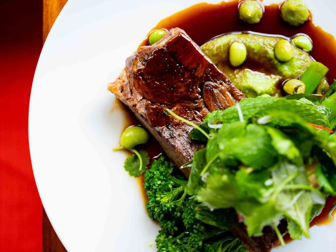 Japanese Lamb Shoulder served, Pullman Palm Cove Sea Resort