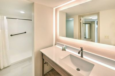 Bathroom of the Ocean View Kitchenette at Daytona Bahama House with a large mirror