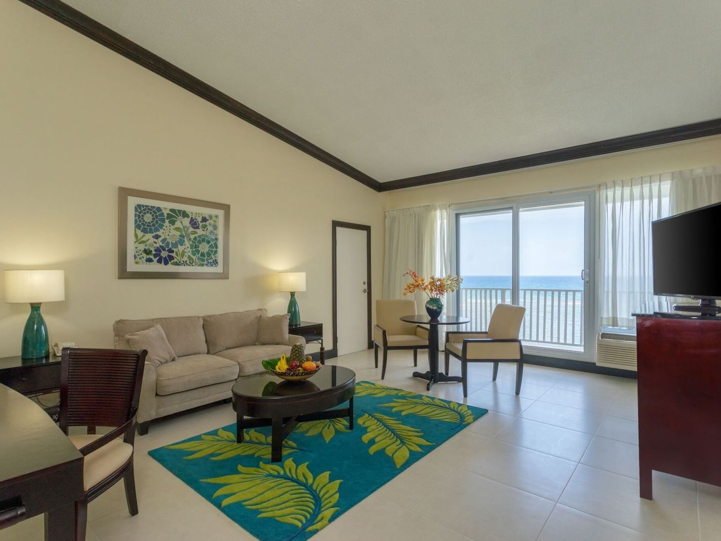 One-Bedroom Suite lounge area overlooking the sea at Holiday Inn Montego Bay
