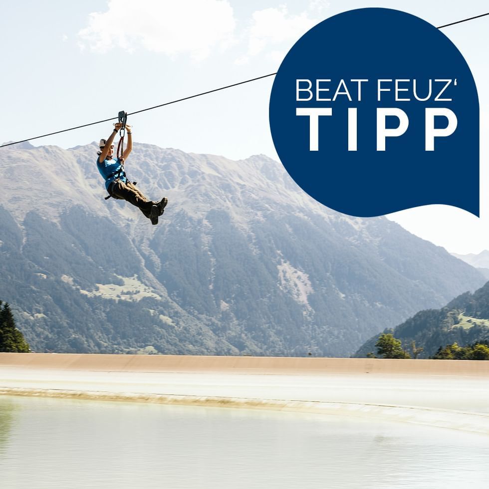 A lady ziplining in Flying-Fox-Golm near Falkensteiner Hotels