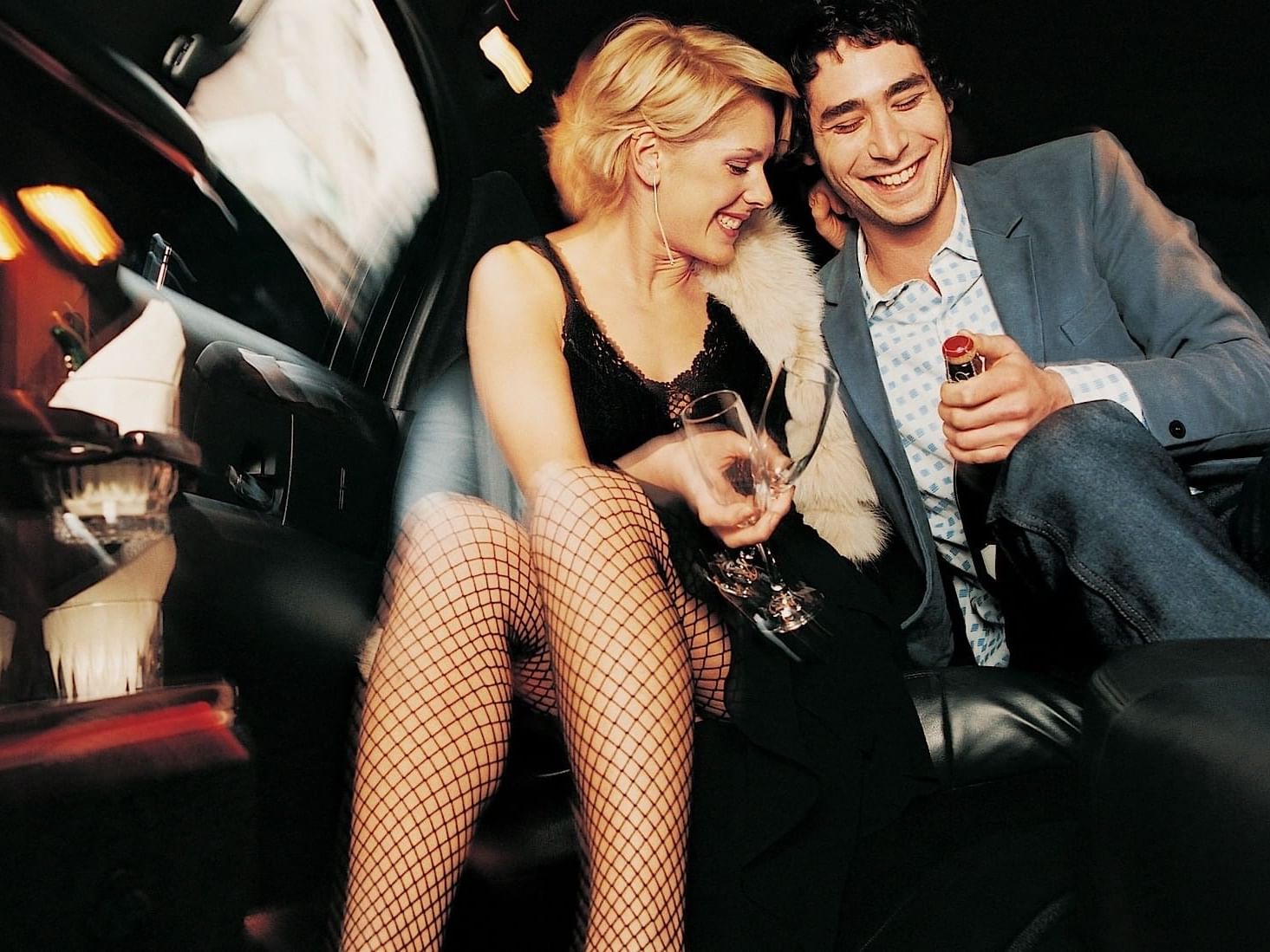Couple enjoying wine near Sanctuary Hotel New York