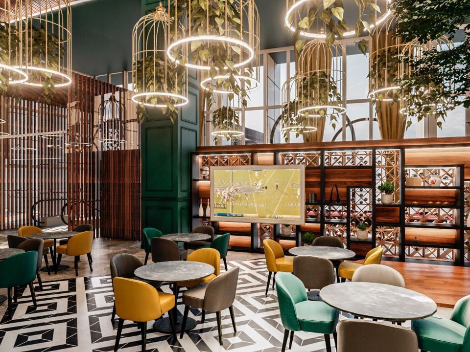 Los Canarios restaurant with pendant lamps at La Colección