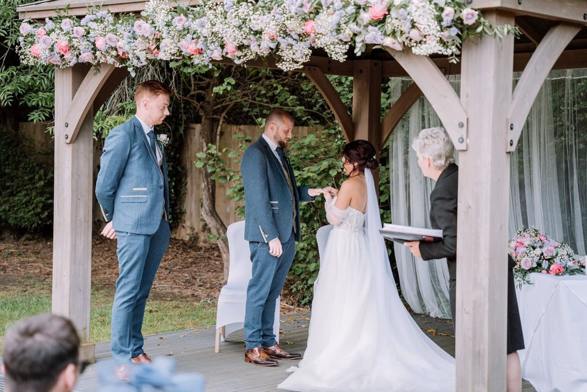 Outdoor wedding ceremony in gazebo at Bridgewood Manor Hotel