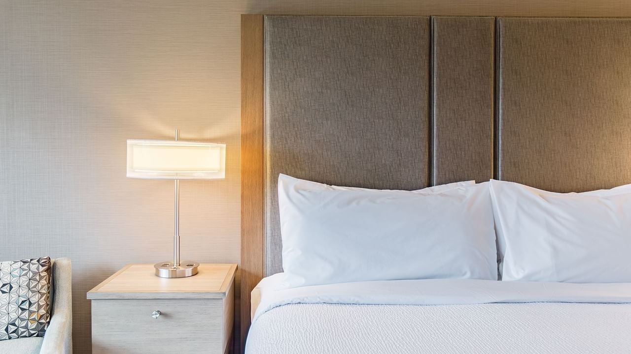 Hotel guestroom with king bed