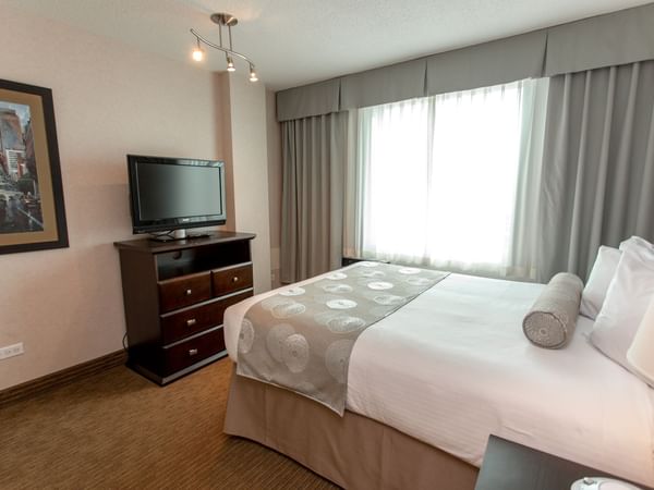 Bed and TV in hotel suite