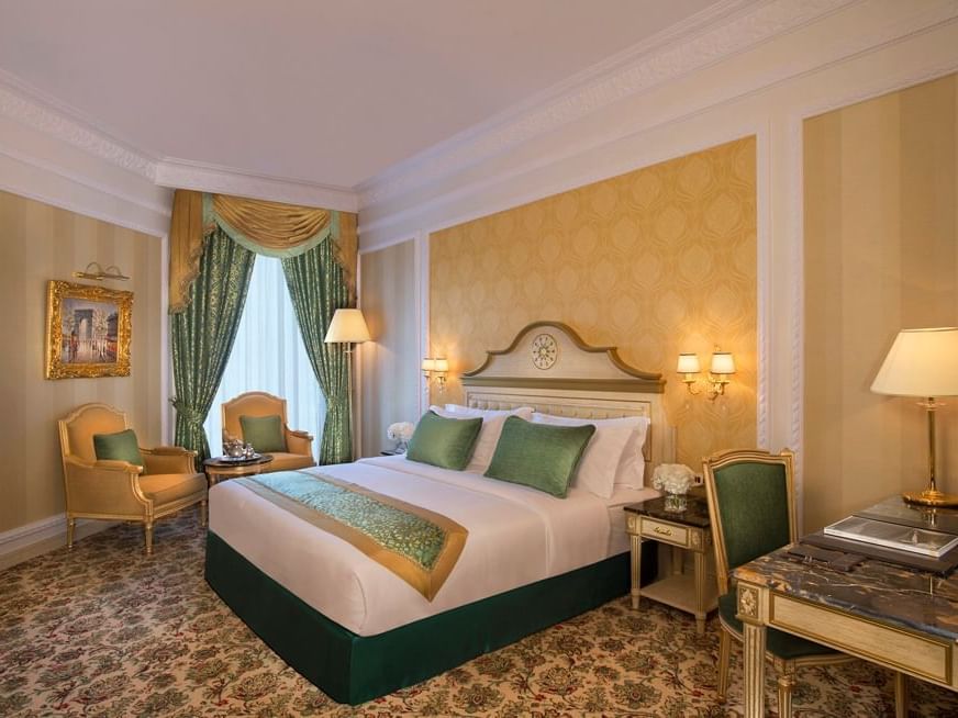 King Bed & furniture in Deluxe Room at City Seasons Hotels