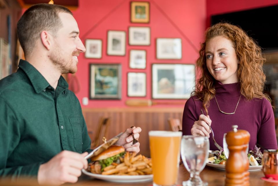 Couple having a meal in a Restaurant at High Peaks Resort