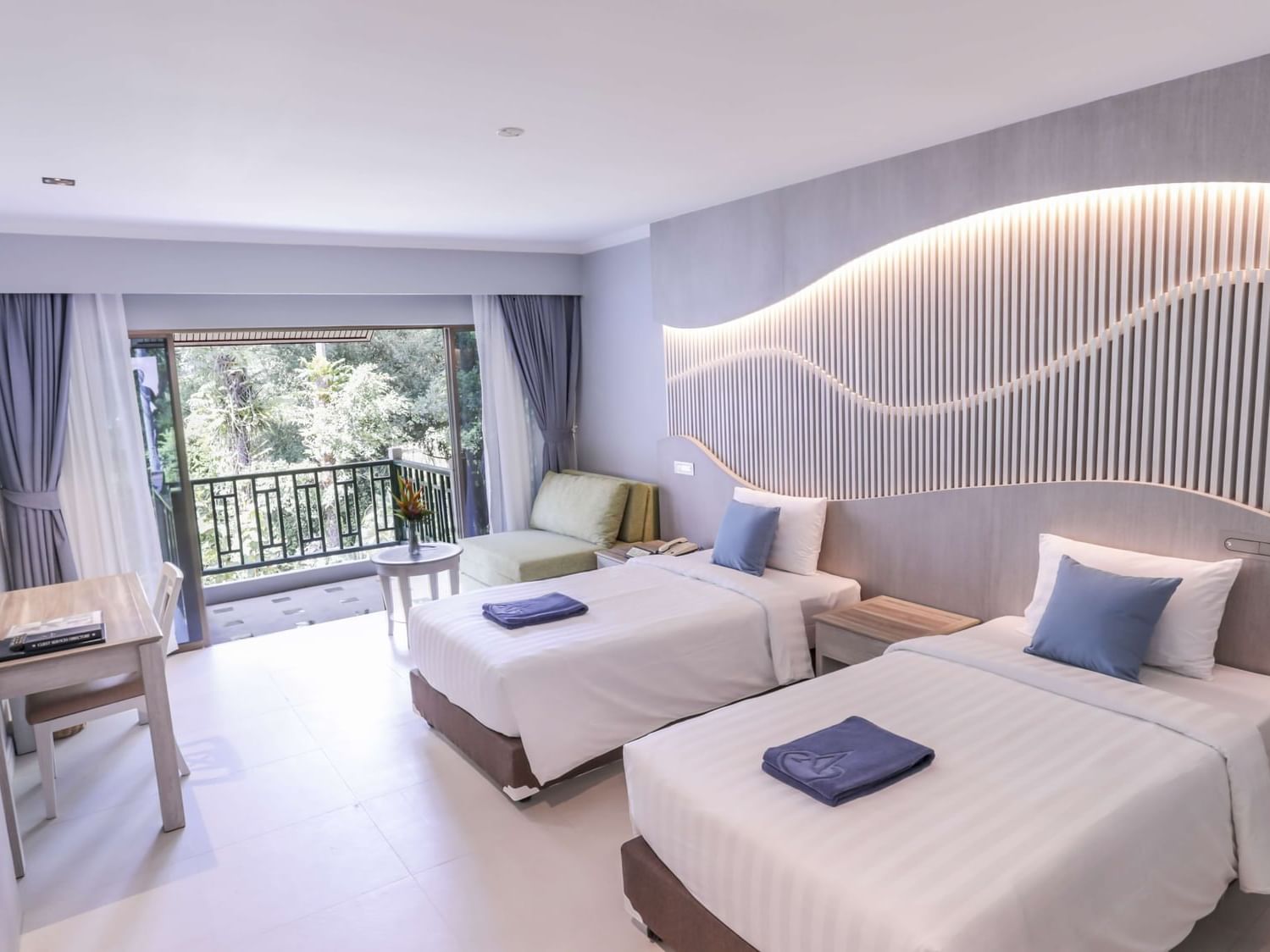 Deluxe Garden View Room at Amora Hotel