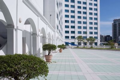 Hotel building with green plants in front at Hanoi Daewoo Hotel